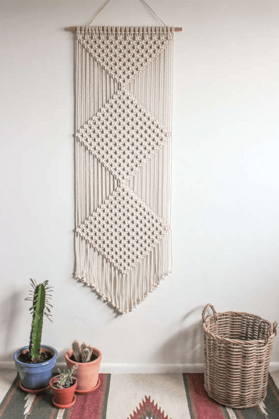 a beautiful macrame wall hanging is a cool idea for a boho space, it will add interest to the space