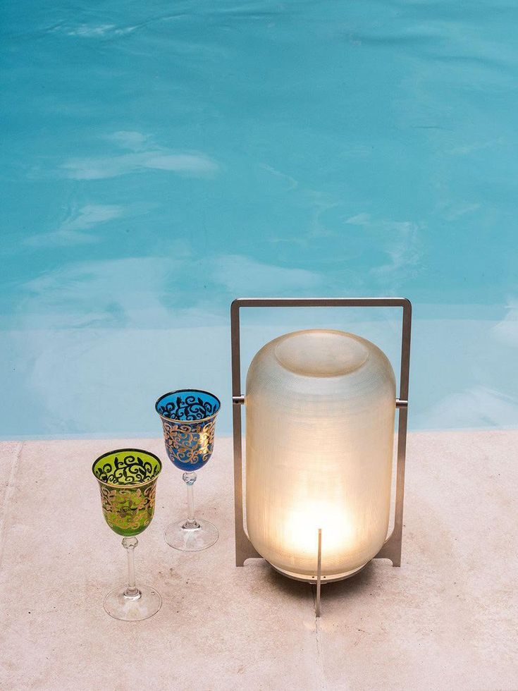 a chic modern portable lamp is a cool solution for any outdoor space, you can put it wherever you like