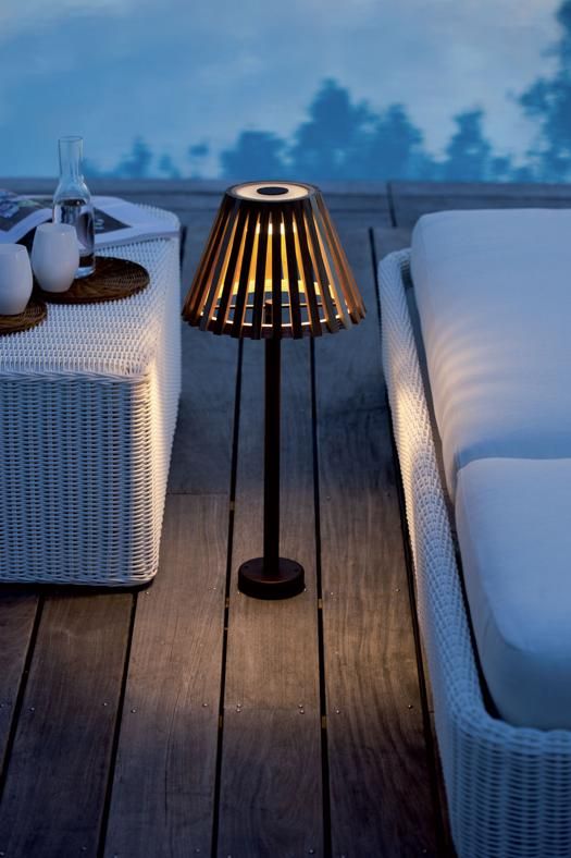 a floor lamp with a wooden lampshade is a stylish idea as it resembles a traditional lamp, it's modern and cool