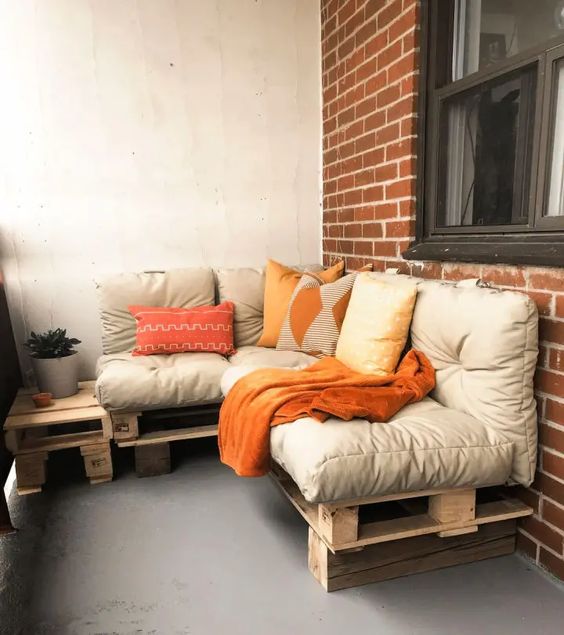 a cool modern balcony with simple pallet corner sofa