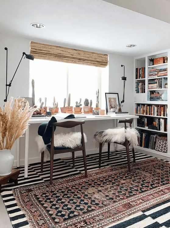 a cozy home office with built-in bookshelves