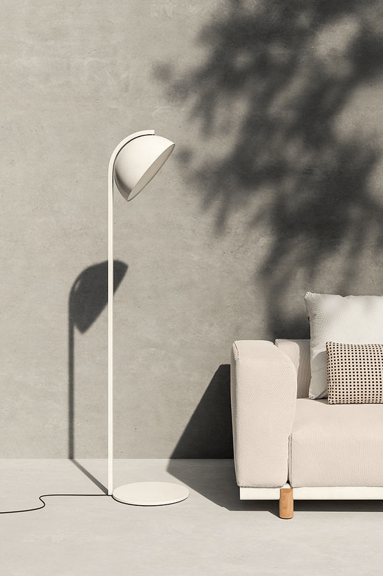 a modern white outdoor floor lamp with a round lampshade will bring coziness and an edgy feel and will blend with your space easily thanks to the universal color