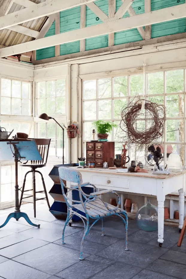 an art studio in a she shed is a great way to enjoy your hobby without being disturbed