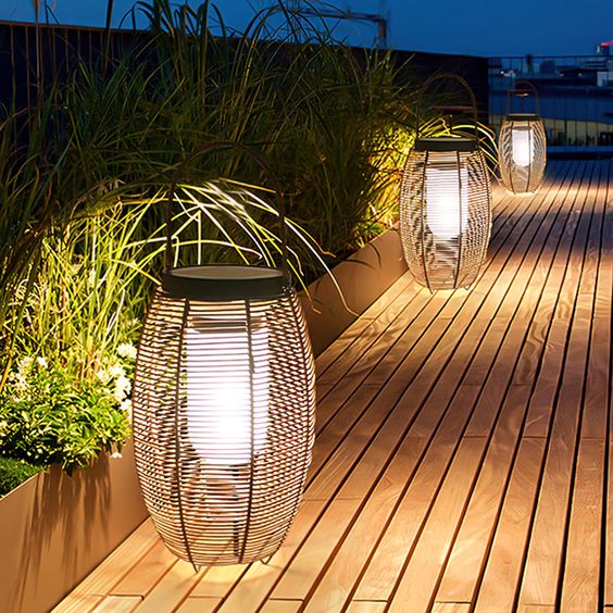 large floor lamps with wicker lampshades that are portable are great for a modern outdoor space