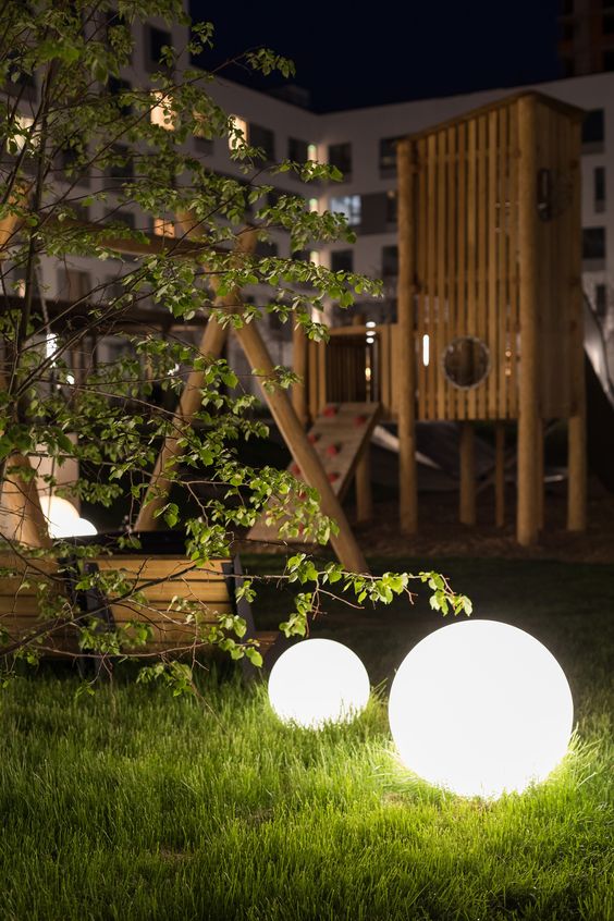 Light sphere like these ones look non obtrusive and modern, they add light and interest to the space