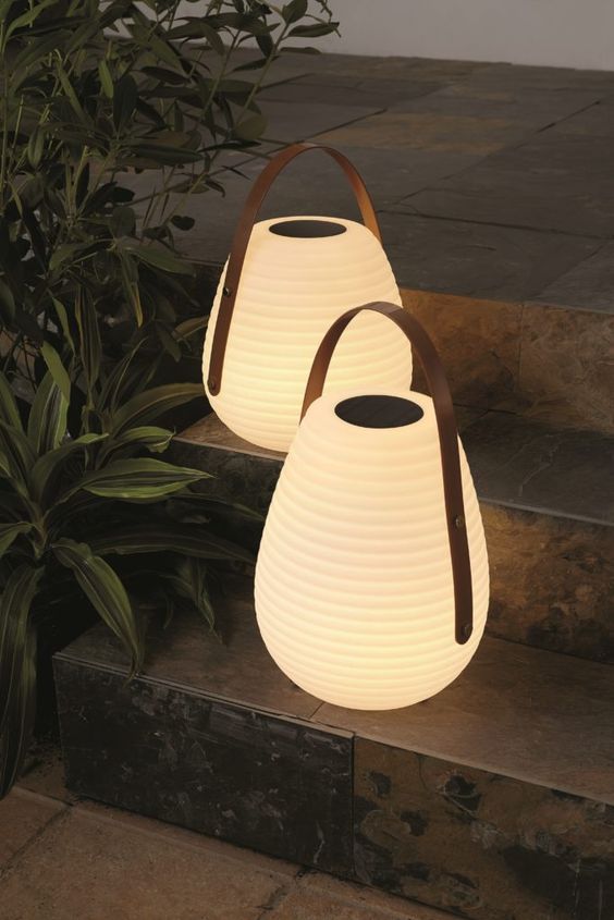 simple and cute portable outdoor lamps with leather handles are great for both indoors and outdoors