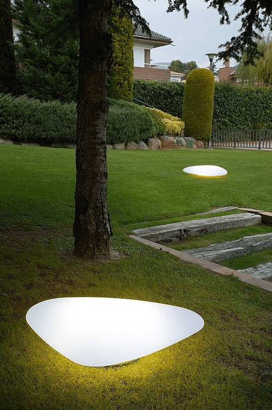 sleek modern pebble-like outdoor lamps liek these ones will instantly add curb appeal to your house and will give an edge to your outdoor space