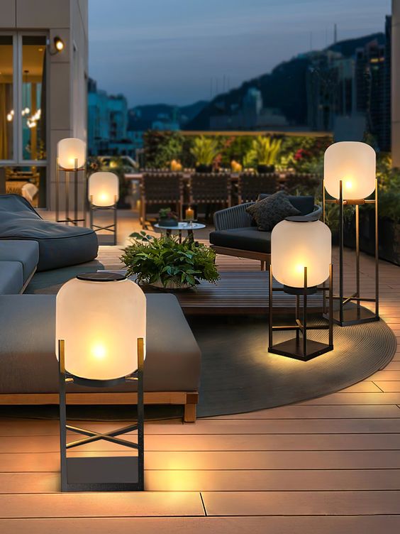 stylish modern outdoor floor lamps with black stands are great for a modern terrace or other outdoor space