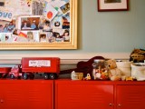 Red Metal Lockers As A Cupboard For A KIds Room