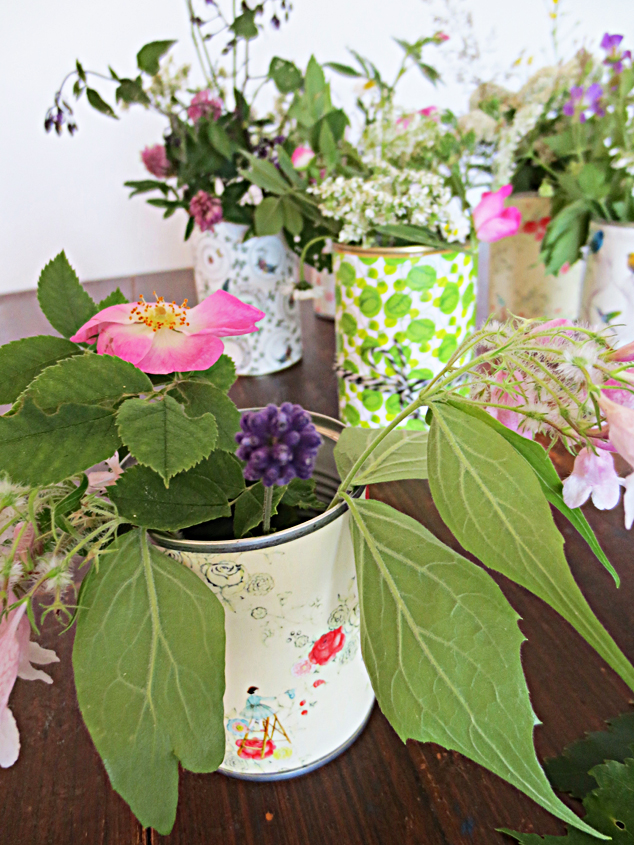 colorful paper tin can vases (via photowall)