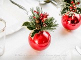evergreen plants and Christmas ornaments centerpieces