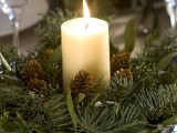 evergreen and candle centerpiece