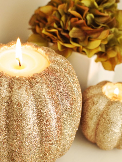 glitter pumpkin candle holders (via shelterness)