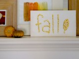 gold studded fall sign