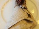 burlap and gilded pinecone napkin rings