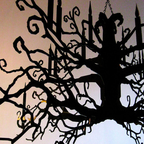 tree branch chandelier (via allthingspaper)