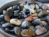 small patio fountain with stones