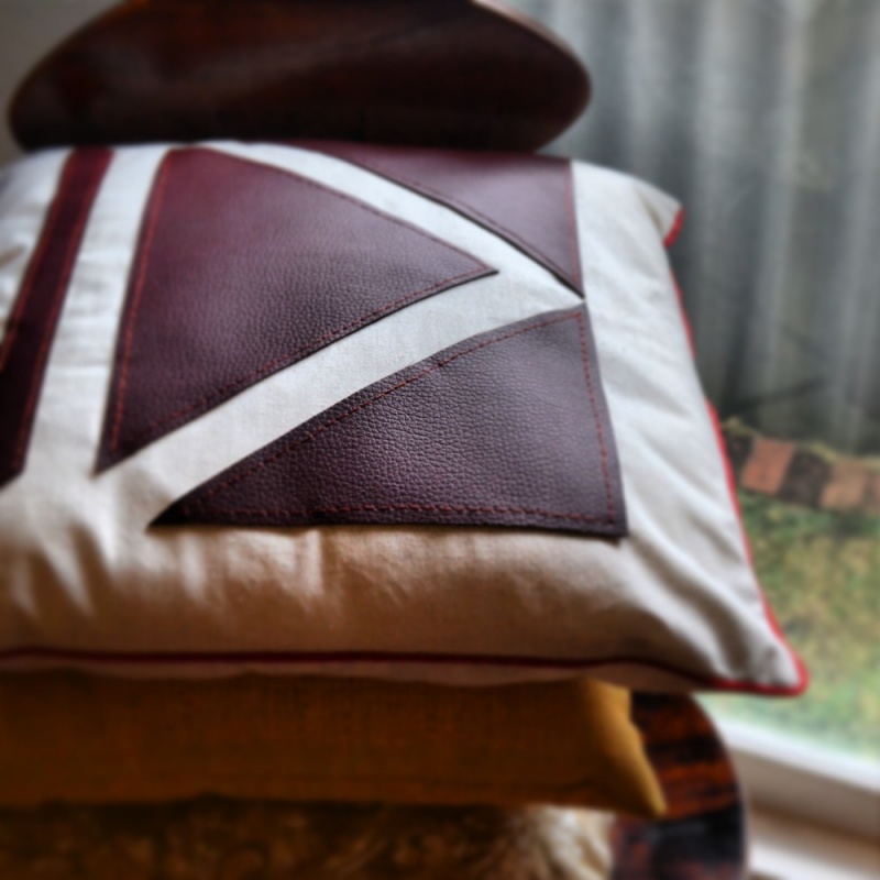leather geometric pillow (via keightlystudio)