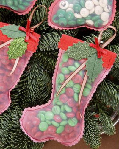 Transparent sock-shaped bags with candies are perfect to hang on a Christmas tree. Just make sure not to empty them too early.
