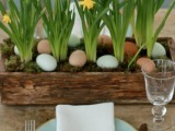 DIY blue eggs and daffodils centerpiece