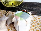 colorful-diy-tassel-pouf-from-old-fabric-straps-1