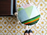 colorful-diy-tassel-pouf-from-old-fabric-straps-8