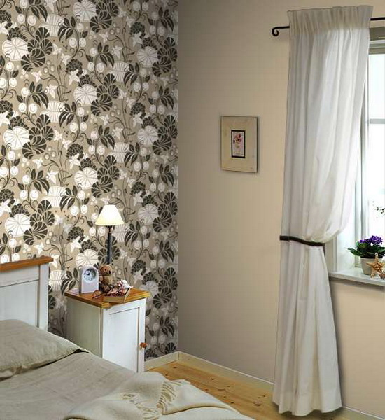 a neutral bedroom with a bright statement wallpaper wall looks cooler and bolder