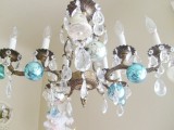 Chandelier with a few Christmas ornaments