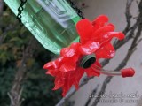 hummingbird feeder of recycled materials