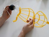 Cool Diy Chandelier Of Bulbs And Cages