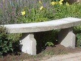 classic garden bench of concrete