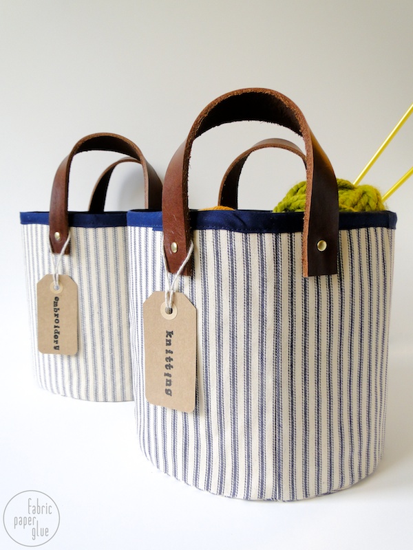 fabric and leather storage baskets (via fabricpaperglue)