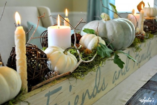 cozy pumpkins and candles centerpiece (via shelterness)