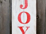 whitewashed JOY sign