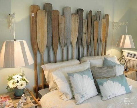 wall sconces with light colored lampshades are nice for a rustic and relaxed bedroom