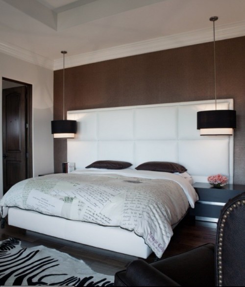 modern square black hanging lamps add chic and a bold touch to the bedroom done in white and brown