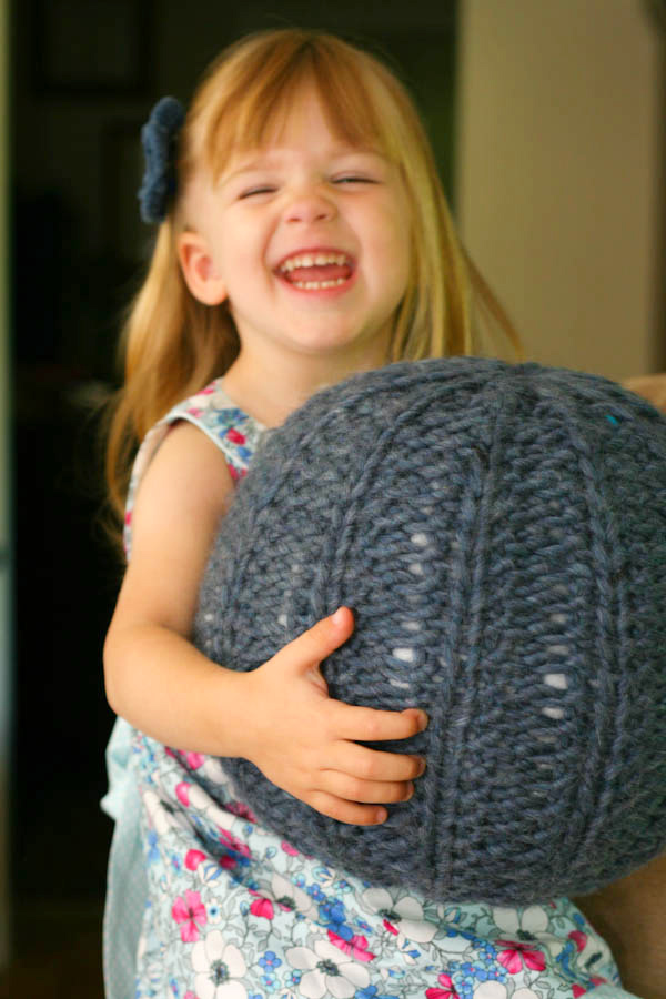 stuffed knitted pouf