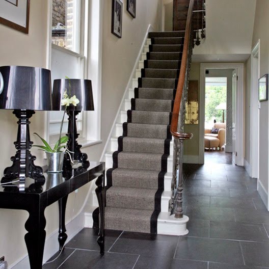 Some people prefer carpet runners that are in contrast with stairs color.