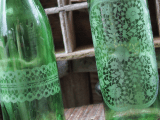 doily printed wine bottles