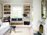 a windowsill sitting space and two bookcases built-in on each side of the bench for comfortable reading