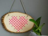 cross stitch heart in wood