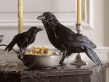 blackbirds, candles and spiderwebs are chic and stylish Halloween decorations you can install anywhere