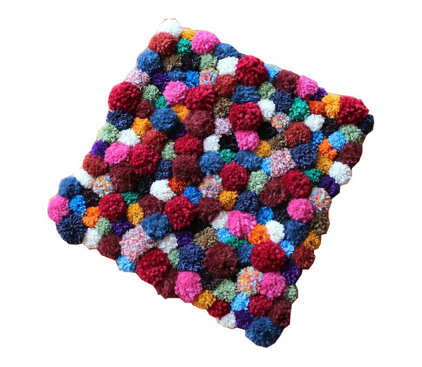 pompom accent rug