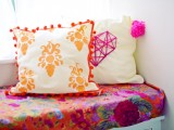baroque print cushion with pompoms edges