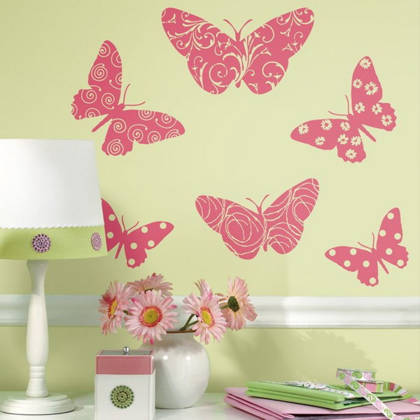yellow wallpaper with pink printed butterflies is a cool and bright idea to rock in the space