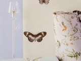 simple brown butterfly decals on the wall will make it stand out a bit and will add a whimsy touch to the decor