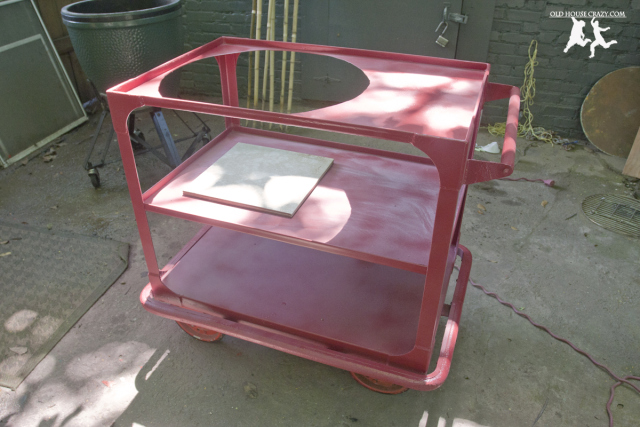 old metal cart into a big green egg table (via oldhousecrazy)