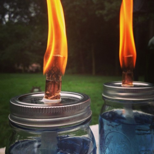 blue mason jar bug repellent candles (via liliesandloafers)