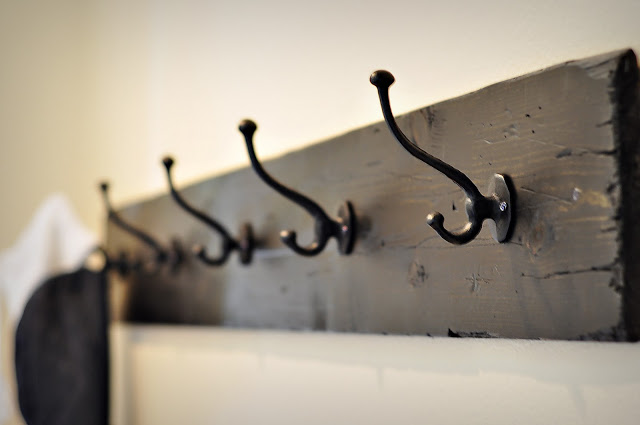 stained coat rack