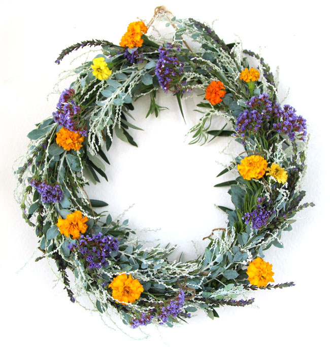 Picture Of diy dollar store wreath with natural flowers and greenery  2